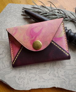 Wallets - All handmade in leather with a variety of designs, leathers, and thread colors.